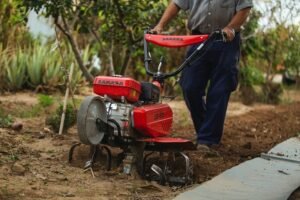 How does a garden tiller work