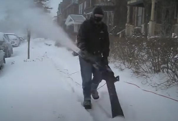 Using an electric leaf blower vacuum to blow snow