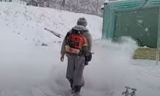 Using a backpack leaf blower to blow snow